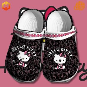 Black Hello Kitty Pattern Crocs Shoes with white interior and pink bow-patterned strap, featuring Hello Kitty faces on a black background.