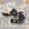 Boston Bruins Crocs Shoes with vibrant Bruins logos and multiple ventilation holes for comfort and breathability.