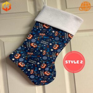 Captain America Christmas Stocking with a repeating pattern of shields, stars, and 'Captain America' text on a navy background with a white cuff.