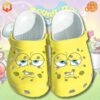 Funny Face Spongebob Squarepants Crocs Shoes displaying SpongeBob's face on yellow clogs with a colorful cartoon background.