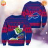 Blue and red Buffalo Bills sweater with a Grinch design.