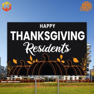 A yard sign with a turkey or fall leaves graphic and the text 'Happy Thanksgiving Residents'.