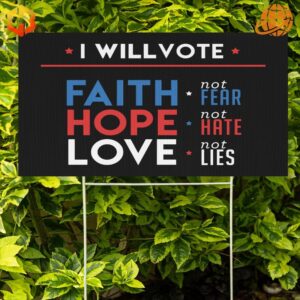 A yard sign with the words 'I Will Vote Faith, Hope, and Love' surrounding a heart graphic.