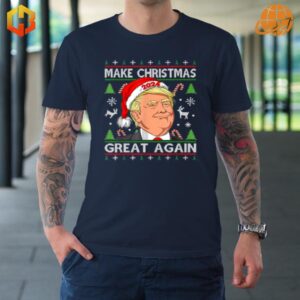 Make Christmas Great Again T-Shirt in navy blue with holiday-themed political design, modeled by tattooed individual.