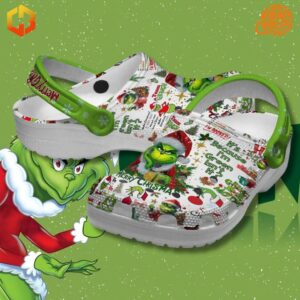 Green-themed Merry Grinchmas The Grinch Crocs Shoes with the phrase 'Because I'm Green, Isn't It?' and Christmas-themed graphics.