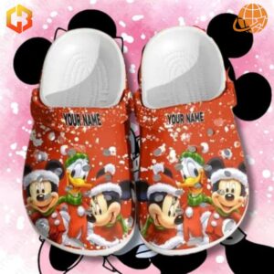 Festive Mickey Minnie Mouse Custom Crocs Shoes with snowfall design, Mickey and Minnie in holiday outfits, and customizable name feature.