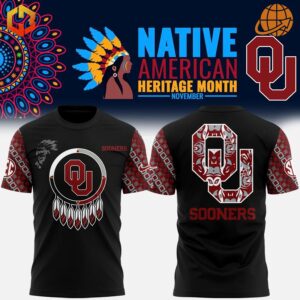 Front and back views of the Oklahoma Sooners Native American Heritage Shirt. The design features a dreamcatcher with the OU logo on the front, tribal patterns on the sleeves, and a bold patterned OU logo on the back, celebrating Native American Heritage Month.