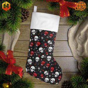 Skull Horror Christmas Stocking with white and red skull pattern on black, displayed with pine branches and red ribbons on wooden background.