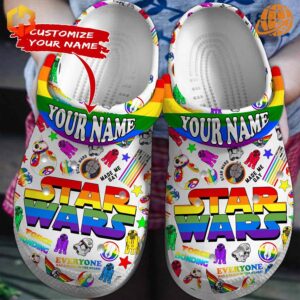 Star Wars Crocs with rainbow Jibbitz charms.