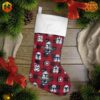 Star Wars Stormtrooper Christmas Stocking with red plaid design and white cuff, displayed with holiday decorations.