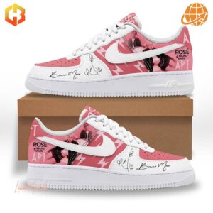 Detailed side view of Bruno Mars Rosé APT Nike Air Force Shoes with graphics and signatures.