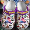 Chris Brown Crocs Shoes with colorful graffiti-style art and a purple strap labeled Chris Brown in yellow font.