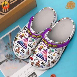 Chris Brown Crocs Shoes showcasing graffiti art with colorful symbols, music-inspired icons, and bold text.