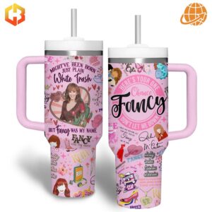 Reba McEntire Fancy Stanley Tumbler featuring a collage of images and lyrics on a pink background.