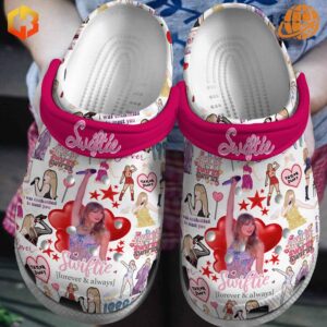 Close-up of Taylor Swift Swiftie Crocs Shoes with vibrant graphics and pink "Swiftie" strap.