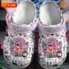 Taylor Swift themed Crocs shoes with colorful design and customizable name strap.