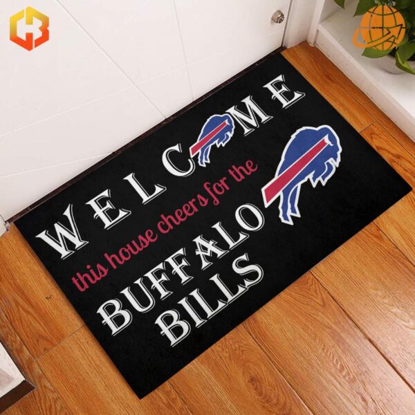 Welcome This House Cheers for the Buffalo Bills Doormat on wooden floor.