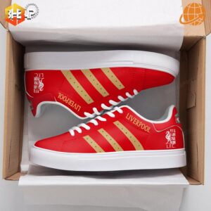 Pair of white Adidas Stan Smith shoes with "You'll Never Walk Alone" and the Liverpool FC crest.